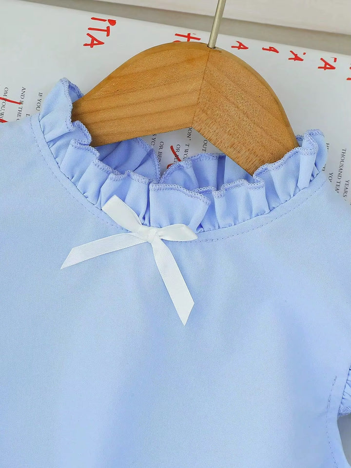 Lotus Leaf Collar Fly Sleeves Top with Bow Denim Stitching Skirt.